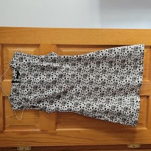 Zara black, white and mustard yellow patterned pleated front dress.